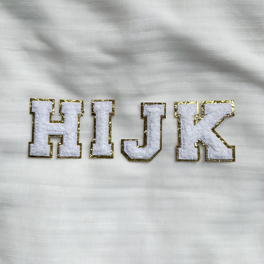 White Alphabet Patches With Gold Trim